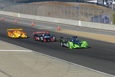 Penske Porshe trying to get around a pair of Acuras