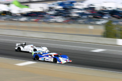 #16 Dyson Racing Lola getting passed by the #66 DeFerran Acura braking for T2