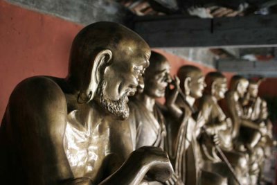 Many different buddhist statues.jpg