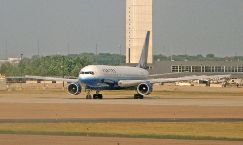 United 757 awaiting clearance (dirty window)