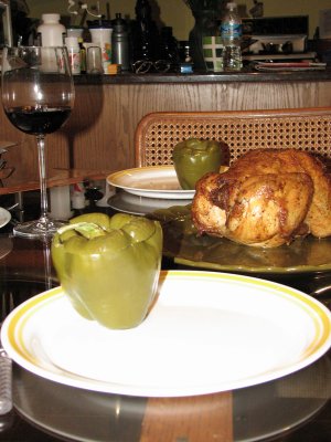 Red wine with roast chicken and stuffed pepper