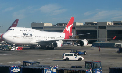 Quantas 747 pushing off from the gate