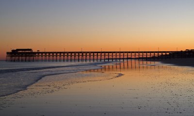 Reflection in the wet sand