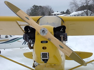 View of the 4 cylinder engine and wood propeller