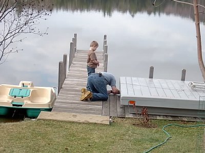 Helping Dad get the float ready to be put into the lake