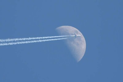 Airplane and the moon