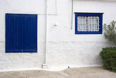 Blue Windows and White Wall