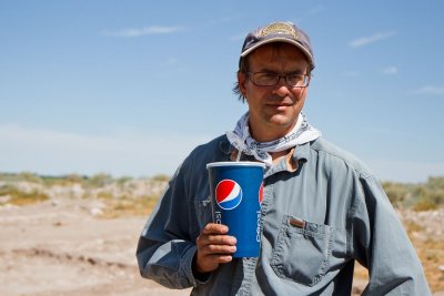 Dr. Bill Walker lectures students on the importance of keeping well hydrated while in the field
