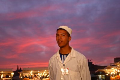 Place Jemaa el-Fna -- worker at open air food stalls