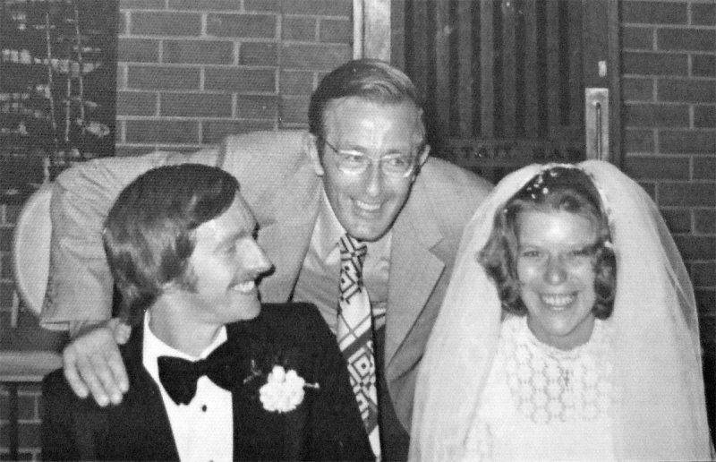 Richard Trebilcock and Mary Leferink congratulated by Bernard Bosmans on their wedding day