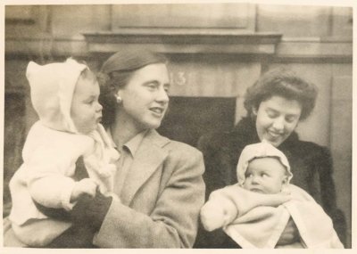 Patty Bell and Pat Bell at the NYC home with the two first born of my generation, Judy and Martha, 1948