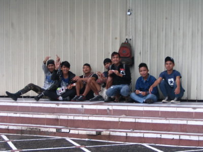Cipanas local youths making hand gestures....