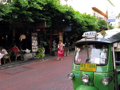 Tuk tuk in front of a restaurant