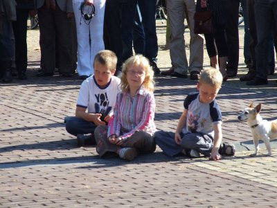 Children were playing quietly during the ceremony
