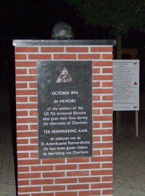 Front of monument with sponsors sign