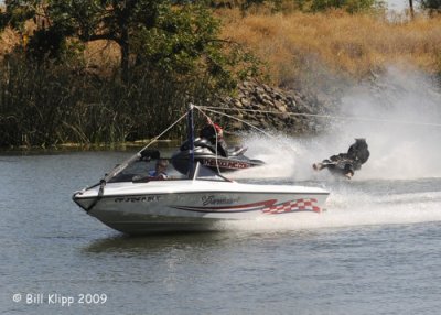 Mike Temby as Batman leaping from Waverunner  2