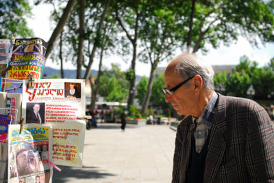 Old man and newspapers - Tbilisi.