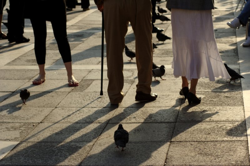 Young and old people in San Marco