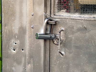 lock gray bullet holes.JPG