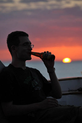 Enjoying a beer at sunset