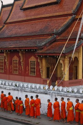 Monks collecting alms at early morning