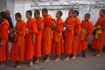 Monks collecting alms at early morning