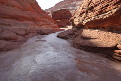 Frozen pothole near the climbing to the Wave