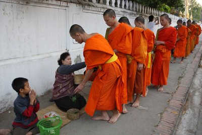 Monks collecting alms