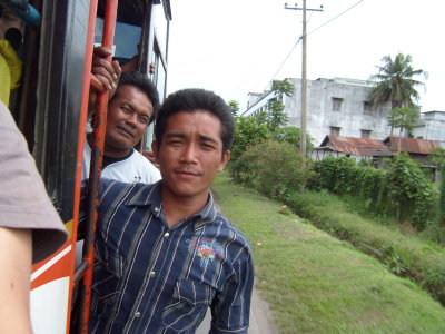 Bus boy - Public bus to Bukit Lawang