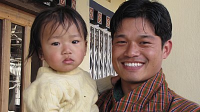 Ugyen (we nicknamed him Angel), our Amazing Driver, and his son