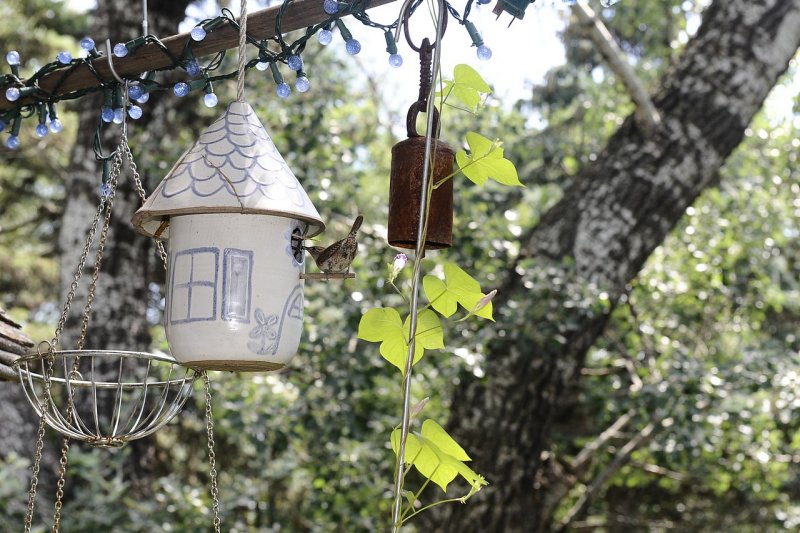 THIS CERAMIC BIRD HOUSE HUNG IN OUR KITCHEN AT RAVENOAKS FOR YEARS