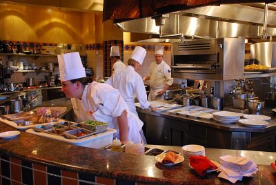 THE STUDENT CHEFS WERE VERY BUSY MAKING OUR MEAL UNDER THE WATCHFUL EYES OF AN INSTRUCTOR