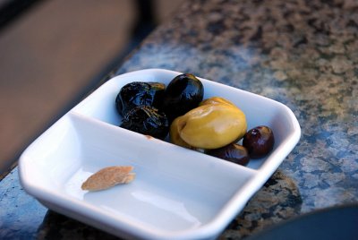 THE DINING BEGAN WITH OLIVES, OIL AND HOMEMADE BREAD