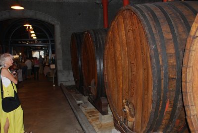 SARA LOVED THE SMELL CREATED BY THESE OLD AGING BARRELS AS WE ENTERED THE MAIN BUILDING