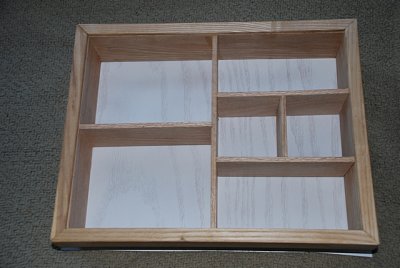 A NEW HOBBY IS BUILDING SHADOW BOXES USING RECYCLED PICTURE FRAMES FROM THRIFT SHOPS