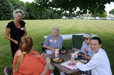 ONE OF OUR FIRST SOCIAL FUNCTIONS WAS THE OAK PARK TERRACE PICNIC-SARA IS COMFORTABLE IN ANY GROUP
