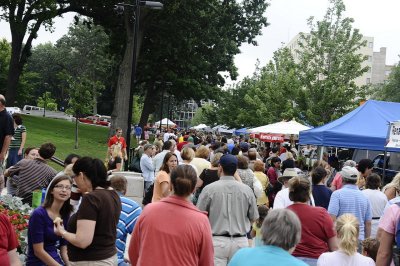 THE FARMER'S MARKET ON THE SQUARE ON SATURDAY MORNINGS IS THE LARGEST IN MADISON