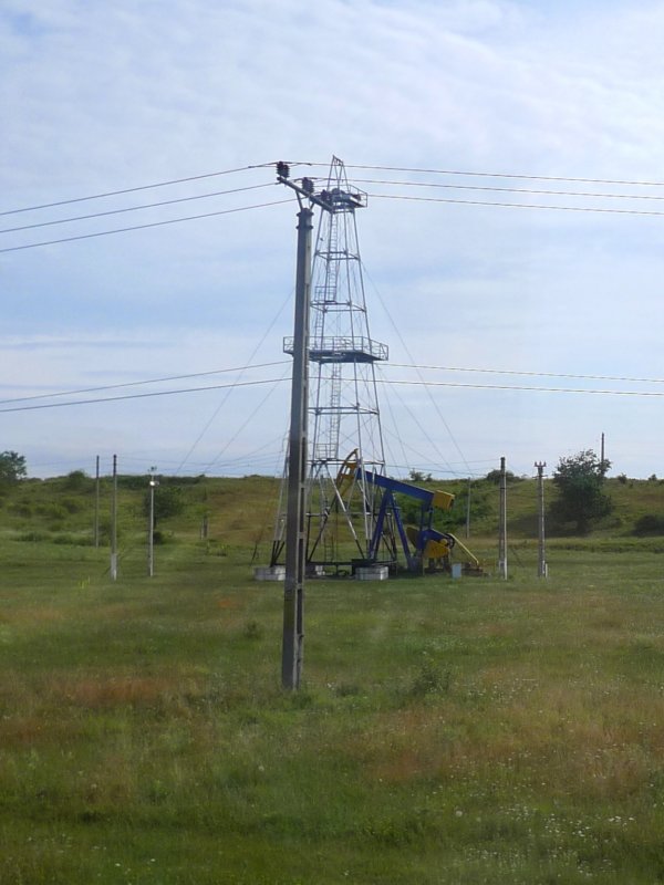 Oil Well Pumpjack in Romanian Countryside