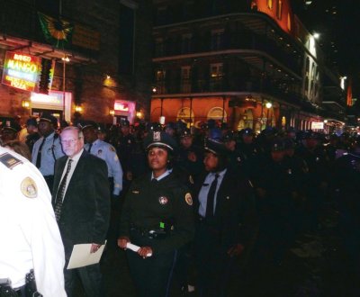 More of Third  Wave of Police Clearing Bourbon St. at Midnight