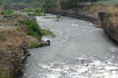 Doing Laundry in a River in Guatemala
