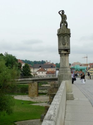 Statue in Center of Regensburg's Medieval Stone Bridge