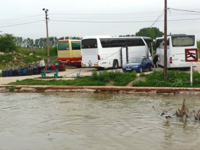 Waiting to Board Buses for Bucharest (River is Very High)