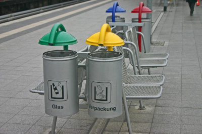 Trash and recyclables on the train platform