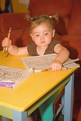 At her new table....with pigtails.