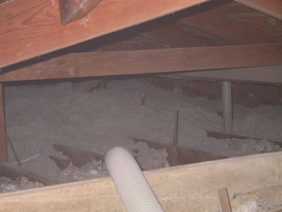 This area of the attic has very little head clearance: a real pain to work in there.
