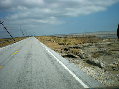 Beach now reaches Hwy 27 in areas east of Holly Beach.