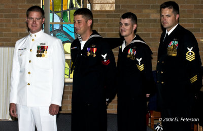 A few of the nation's finest taking a few moments out for a wedding.  That is my nephew in white.