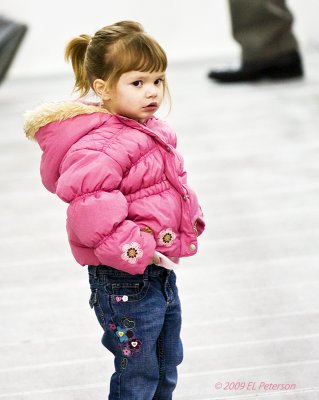 This little girl appears not to be too happy with me taking her photo at her Dad's hockey game.