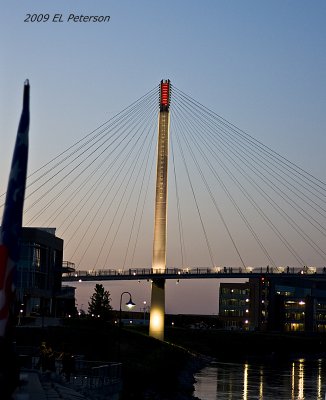 A handheld twilight view of the Bob Kerry Pedestrian bridge.