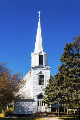 It is always good to see a country church still in use today. This is just up the road from my high school friend's farm.
An image may be purchased at http://edward-peterson.artistwebsites.com/featured/tabor-country-church-edward-peterson.html